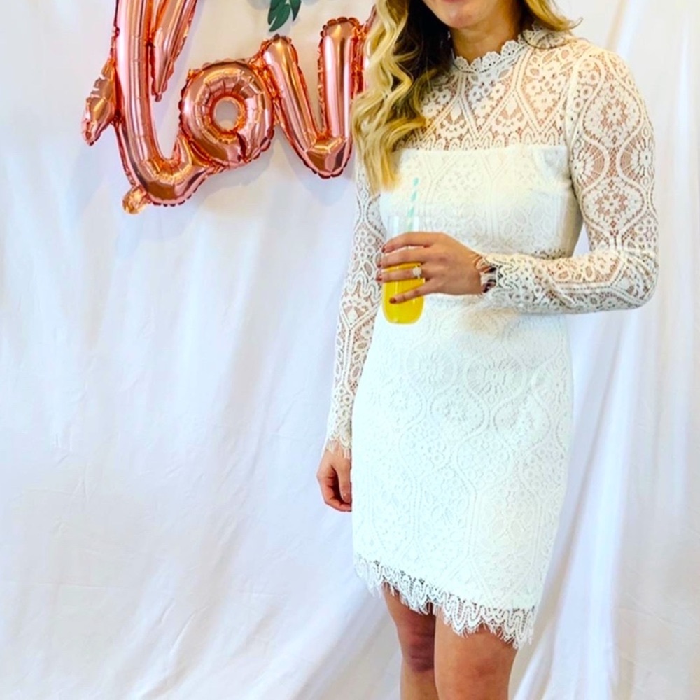 Like new Lulu’s long sleeve white dress! Stunning detail!